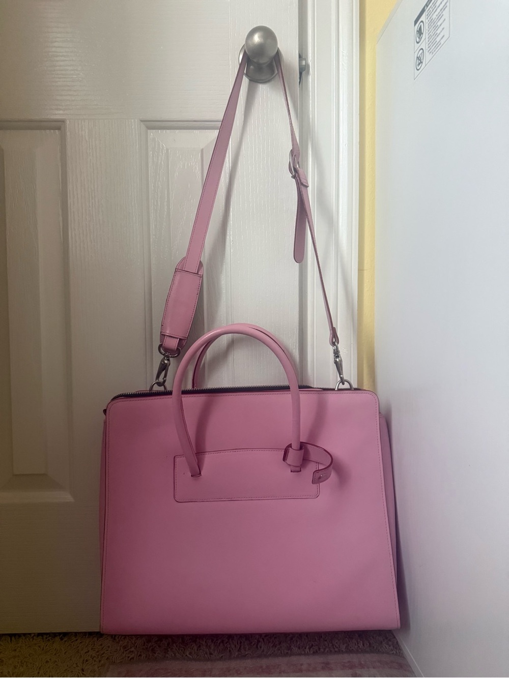 Structured Pink Satchel with Top Handles and Adjustable Strap